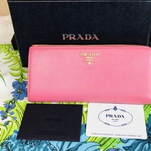 Prada pink zippy wallet